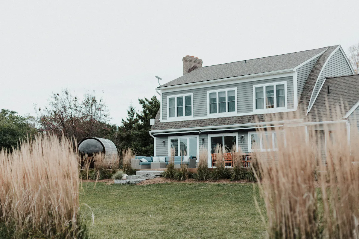 Orleans home with new windows and entry door showing modern styling