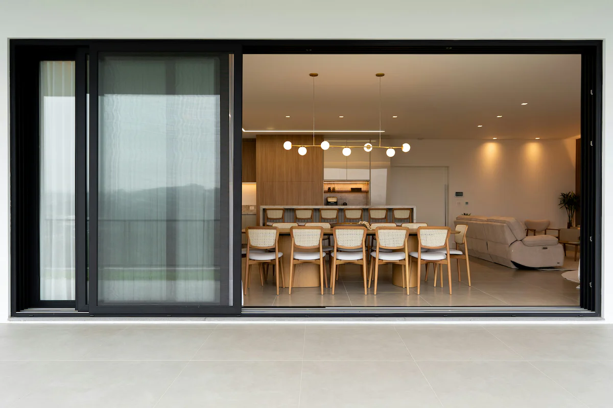 Wider multi-panel stacking patio door system fully opened