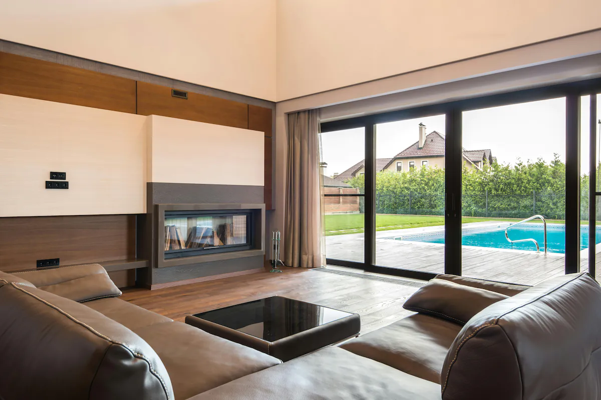 Sliding patio door open onto Ottawa backyard deck showing wide glass panel and clean track system